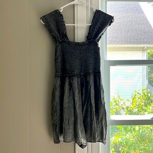 Brand new romper from Red Dress. Size small.